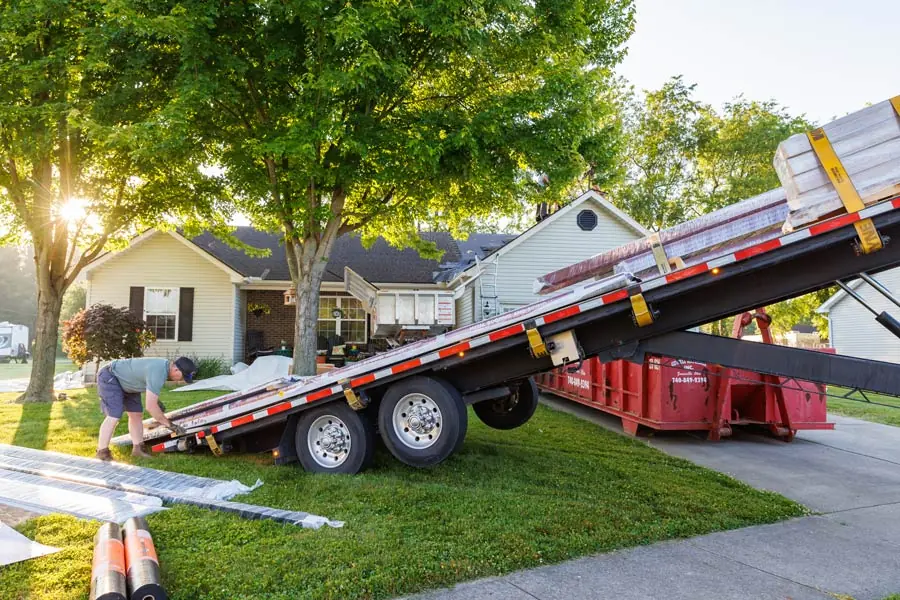 Truck unloading roof parts